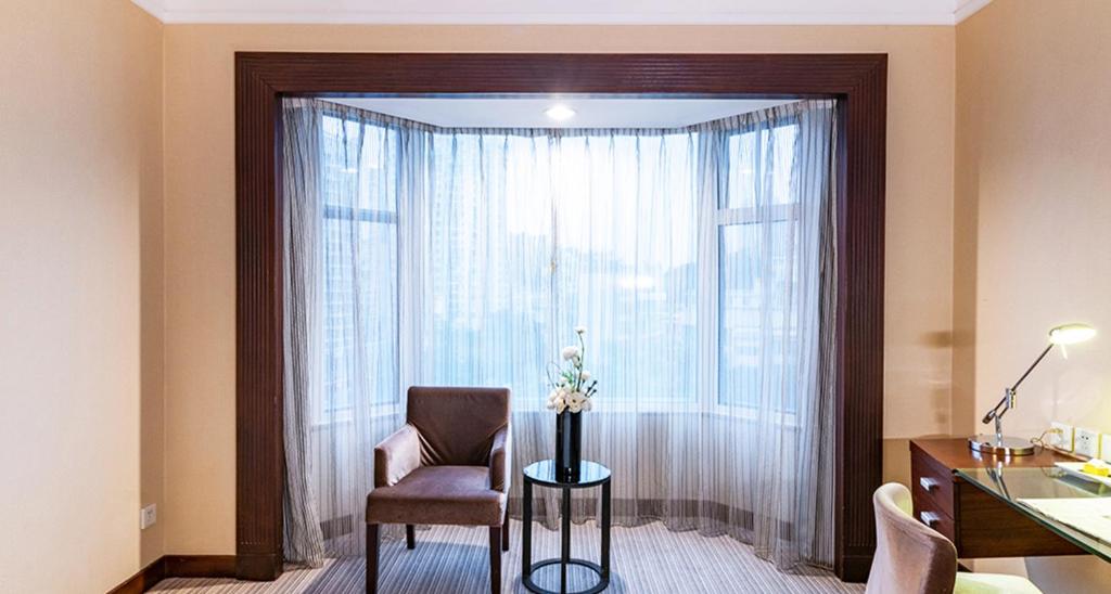 Posezení v ubytování Millennium Harbourview Hotel Xiamen-Near Metro Station & Zhongshan Road