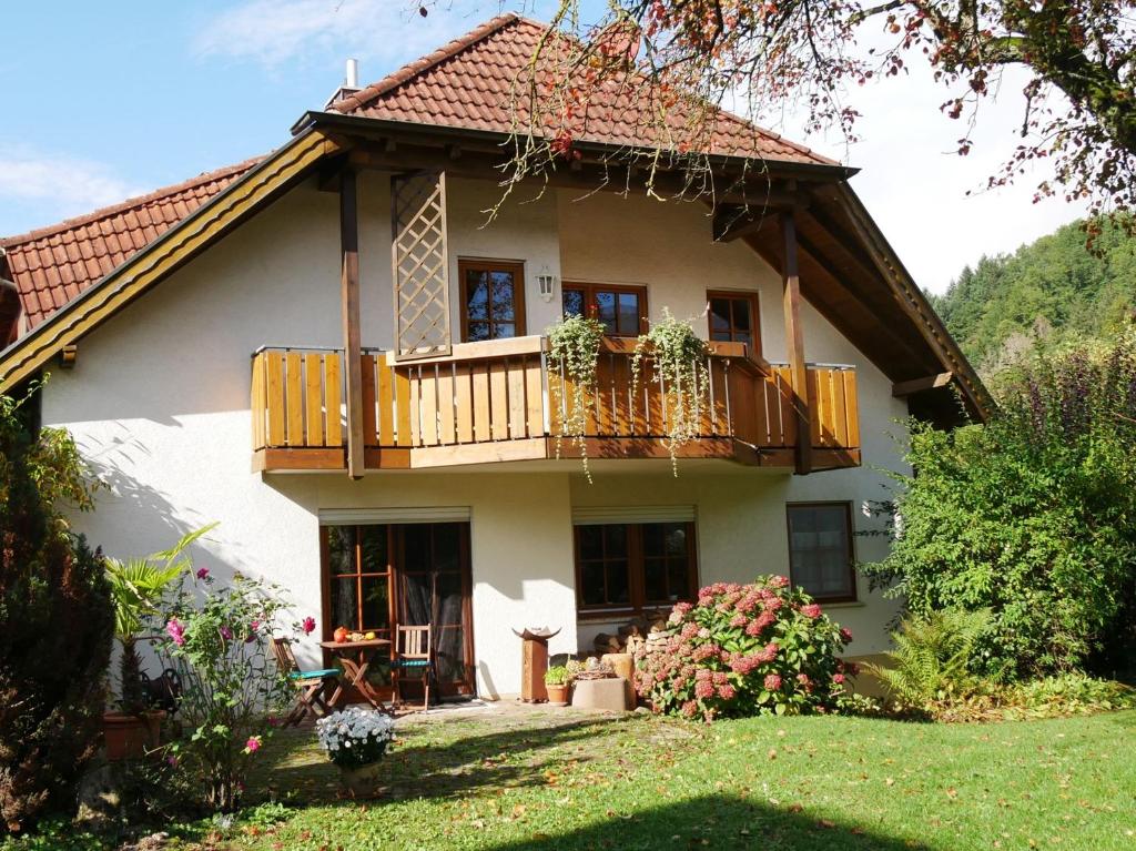 a small house with a balcony and a porch at Haus Johanna in Glottertal