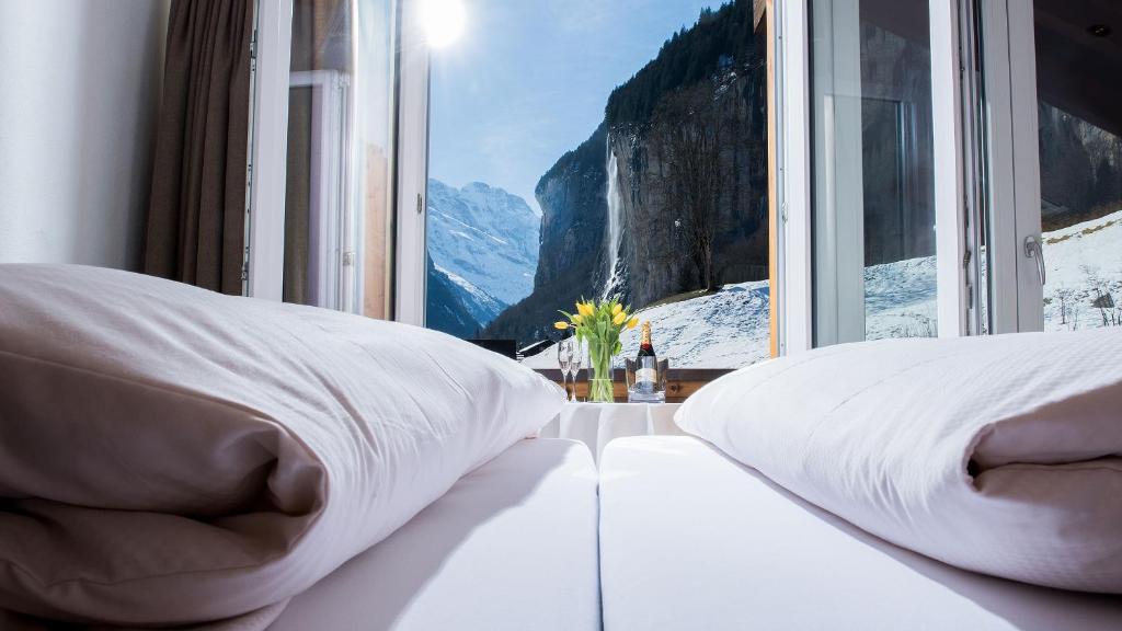 Postel nebo postele na pokoji v ubytování Hotel Silberhorn