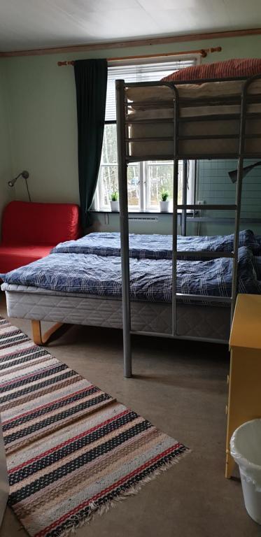 Postel nebo postele na pokoji v ubytování Lönneberga Vandrarhem & Hostel