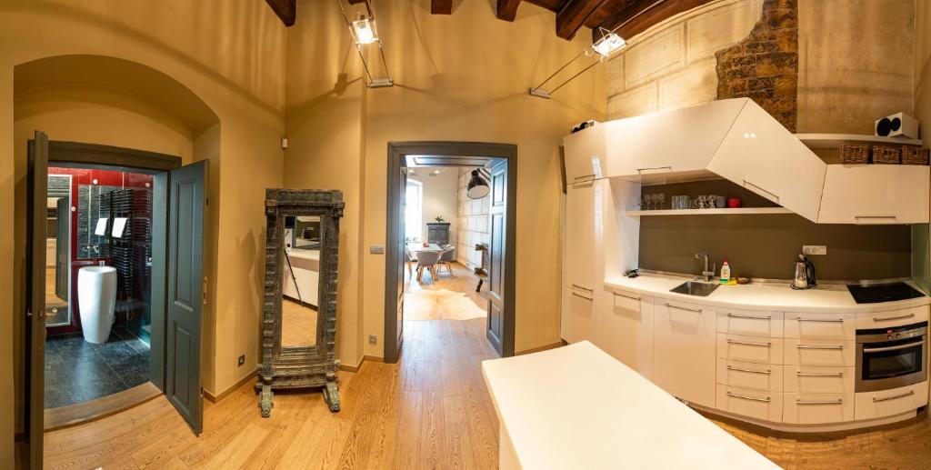 Kuchyň nebo kuchyňský kout v ubytování Mostecka Apartment