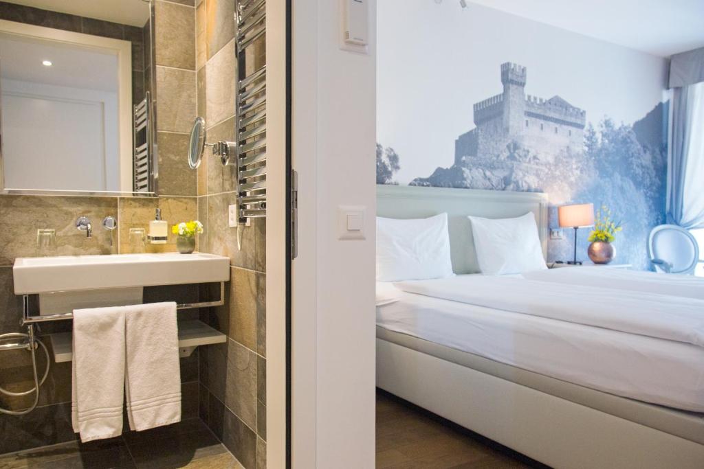 Postel nebo postele na pokoji v ubytování Boutique & Business Hotel La Tureta