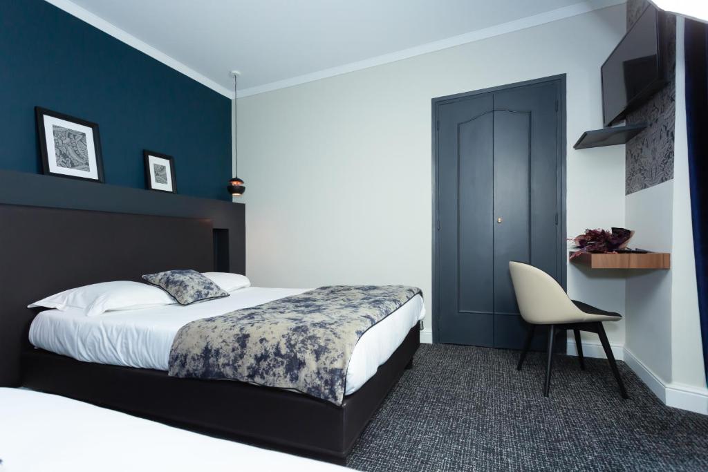 Postel nebo postele na pokoji v ubytování Babbu Hotel