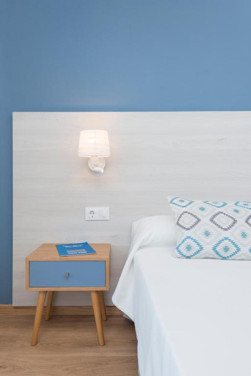 Posteľ alebo postele v izbe v ubytovaní Hotel Vista Park