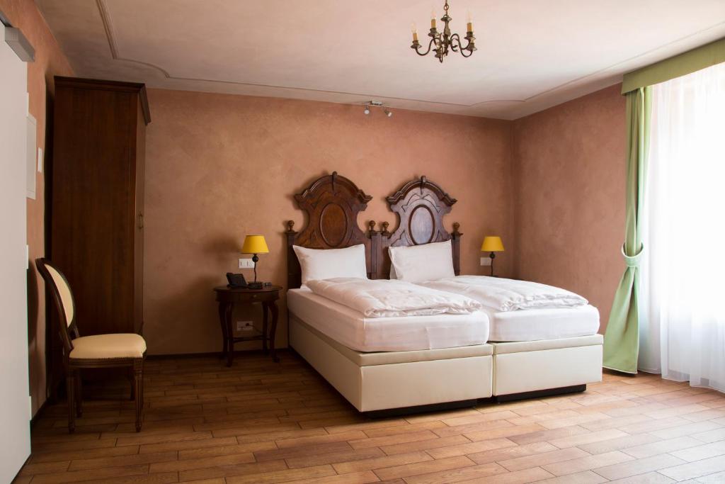 Postel nebo postele na pokoji v ubytování Boutique & Business Hotel La Tureta