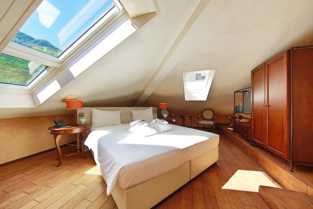 Postel nebo postele na pokoji v ubytování Boutique & Business Hotel La Tureta