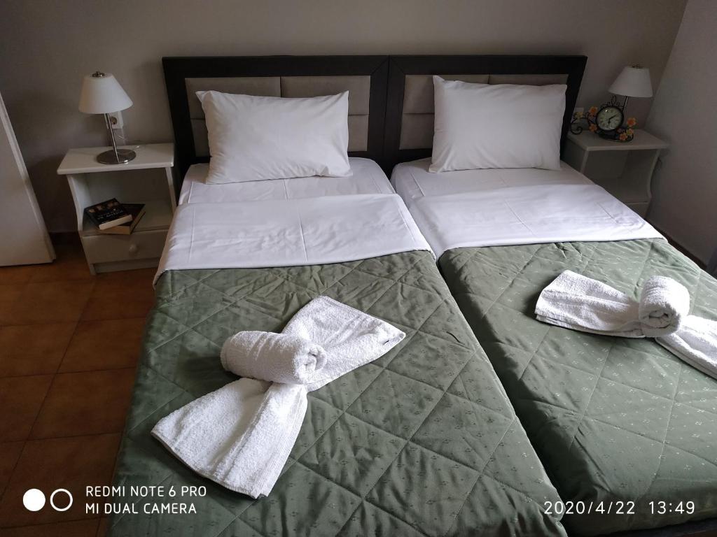 Postel nebo postele na pokoji v ubytování Central Hotel