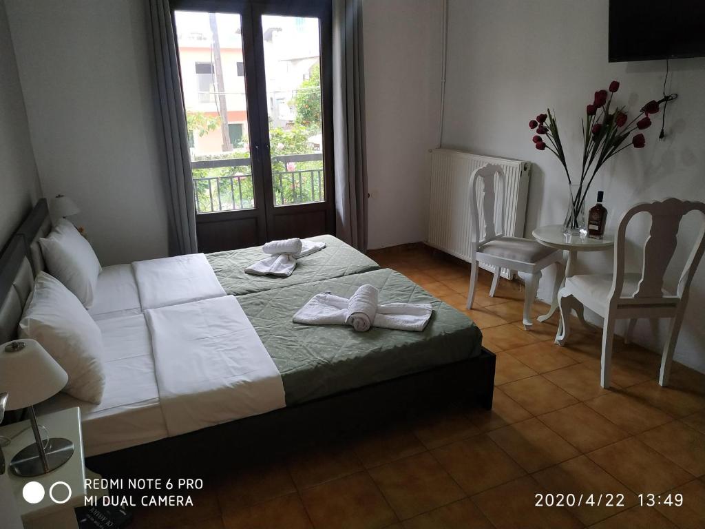 Postel nebo postele na pokoji v ubytování Central Hotel