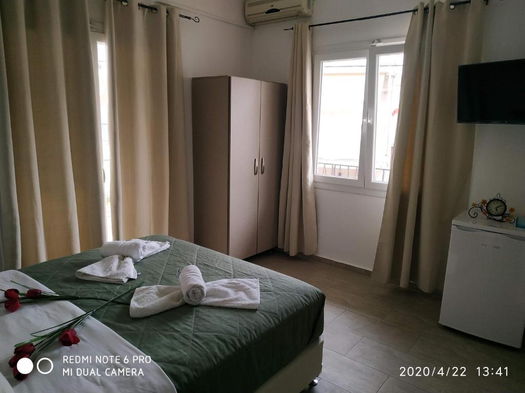 Postel nebo postele na pokoji v ubytování Central Hotel