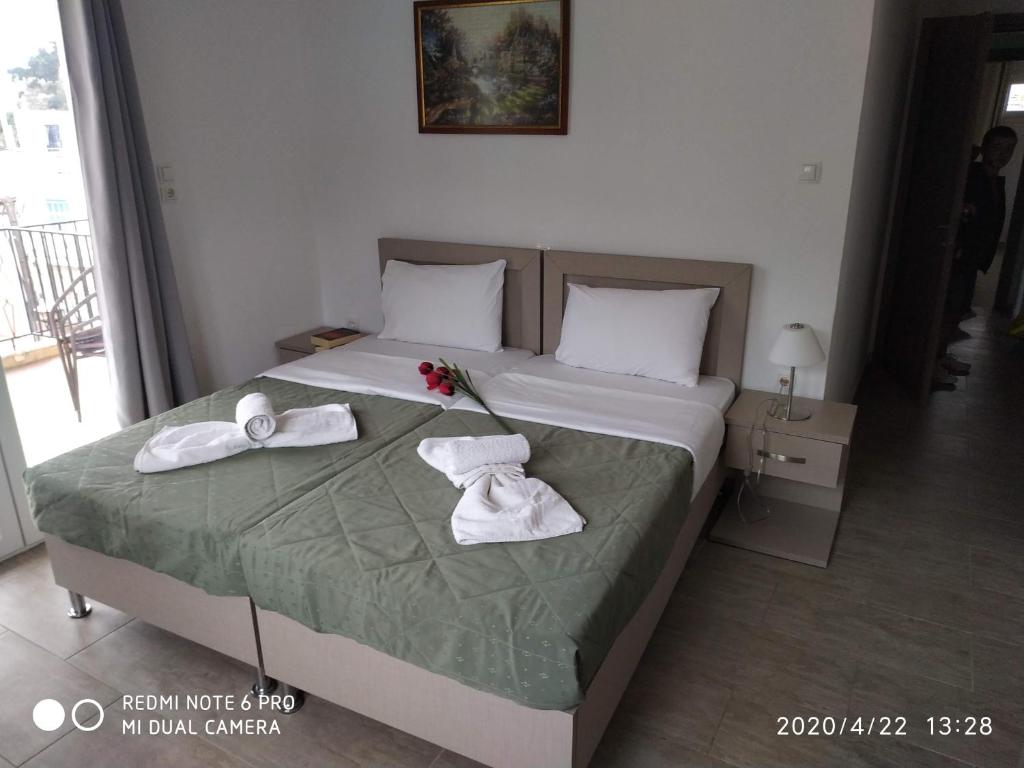 Postel nebo postele na pokoji v ubytování Central Hotel