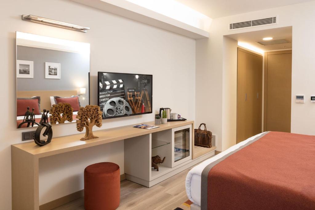 TV a/nebo společenská místnost v ubytování TRYP by Wyndham Ankara Oran