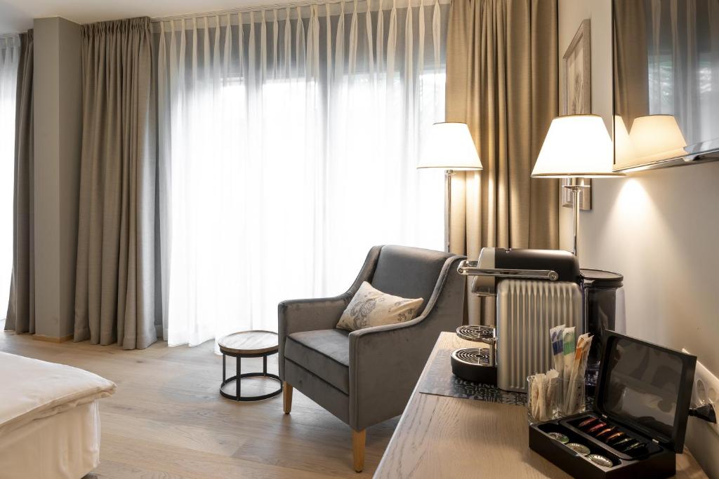 Posezení v ubytování Hotel Ascovilla Charming Hideway