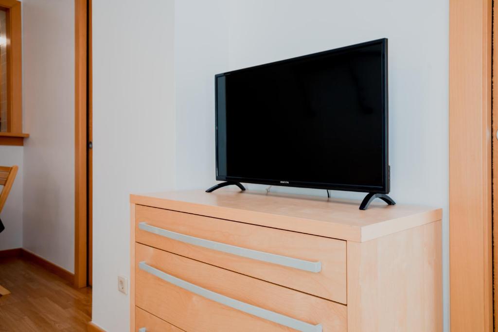 TV a/nebo společenská místnost v ubytování Apartaments Ashome