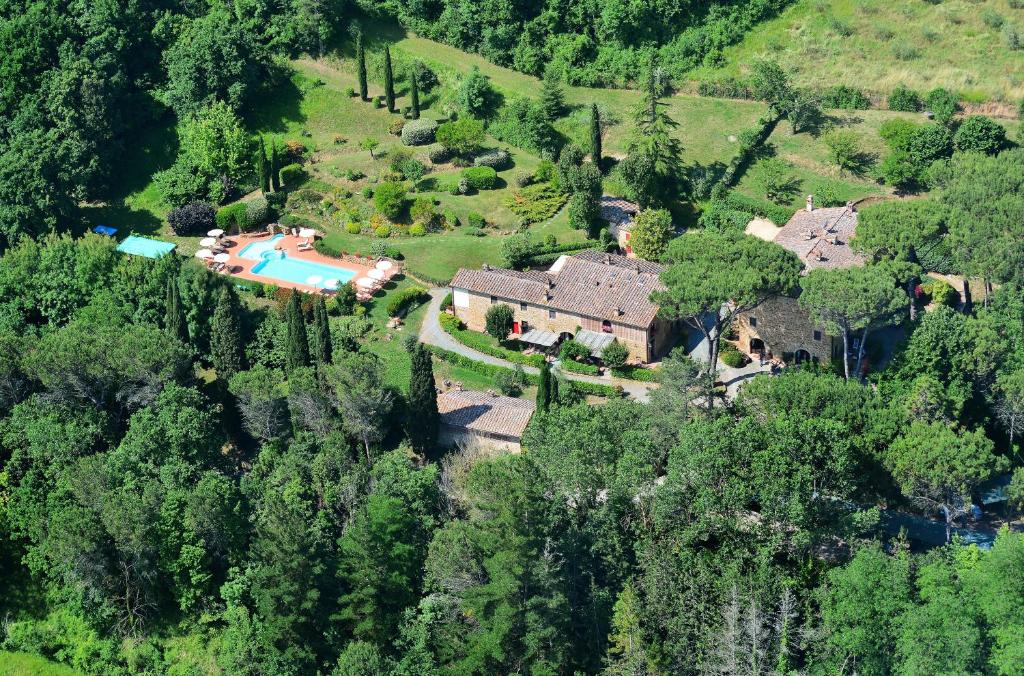an aerial view of a house with a swimming pool at Il Lebbio Agriresort in Montaione