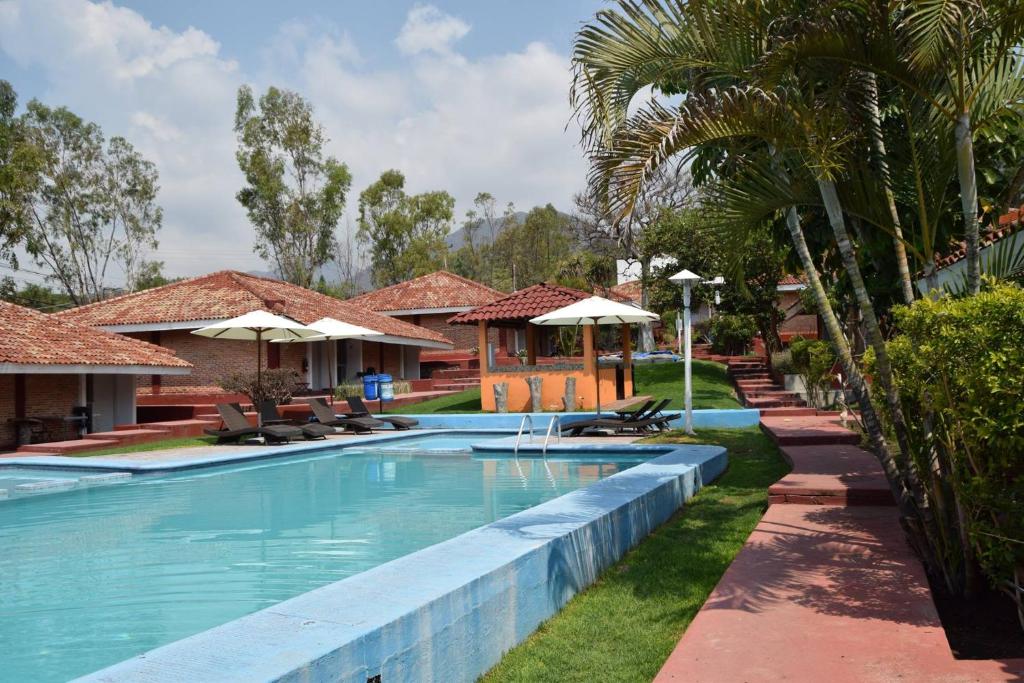 Bazén v ubytování Hotel Chapala Country nebo v jeho okolí