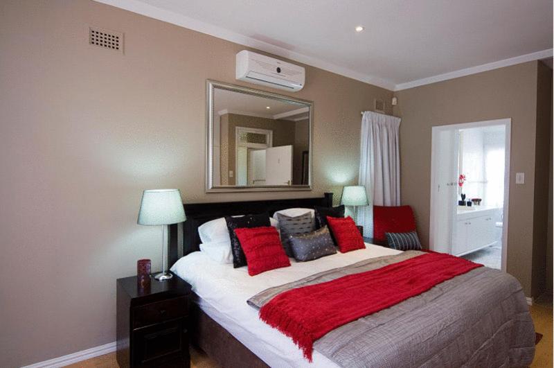 En eller flere senge i et værelse på La Loggia on Portland