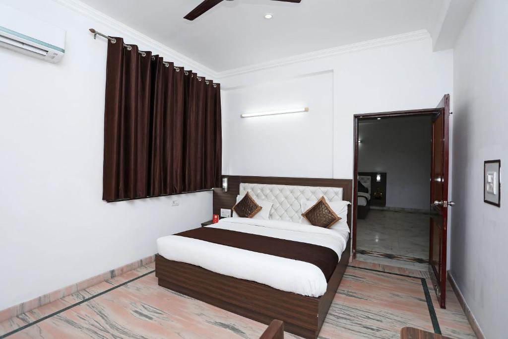 Postel nebo postele na pokoji v ubytování Hotel Marc Royal