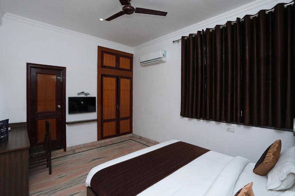 Postel nebo postele na pokoji v ubytování Hotel Marc Royal