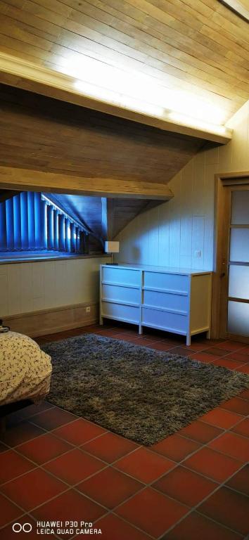 Postel nebo postele na pokoji v ubytování Le Durbuy Lodge