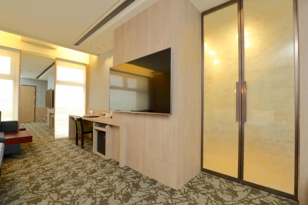 TV a/nebo společenská místnost v ubytování Kloud Hotel