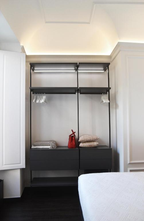 Posteľ alebo postele v izbe v ubytovaní PALAZZO DELLE SIRENE Deluxe Apartment & Boutique Rooms