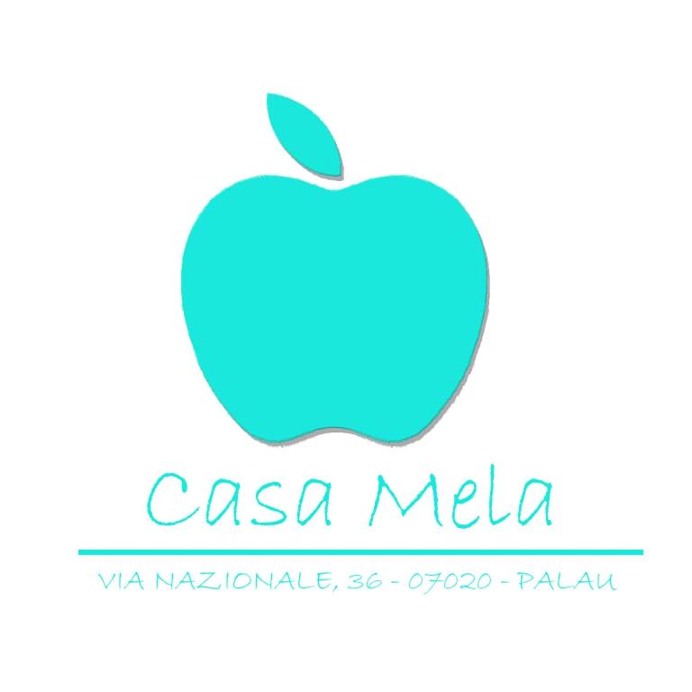 an apple logo with a blue apple at Casa MELA in Palau