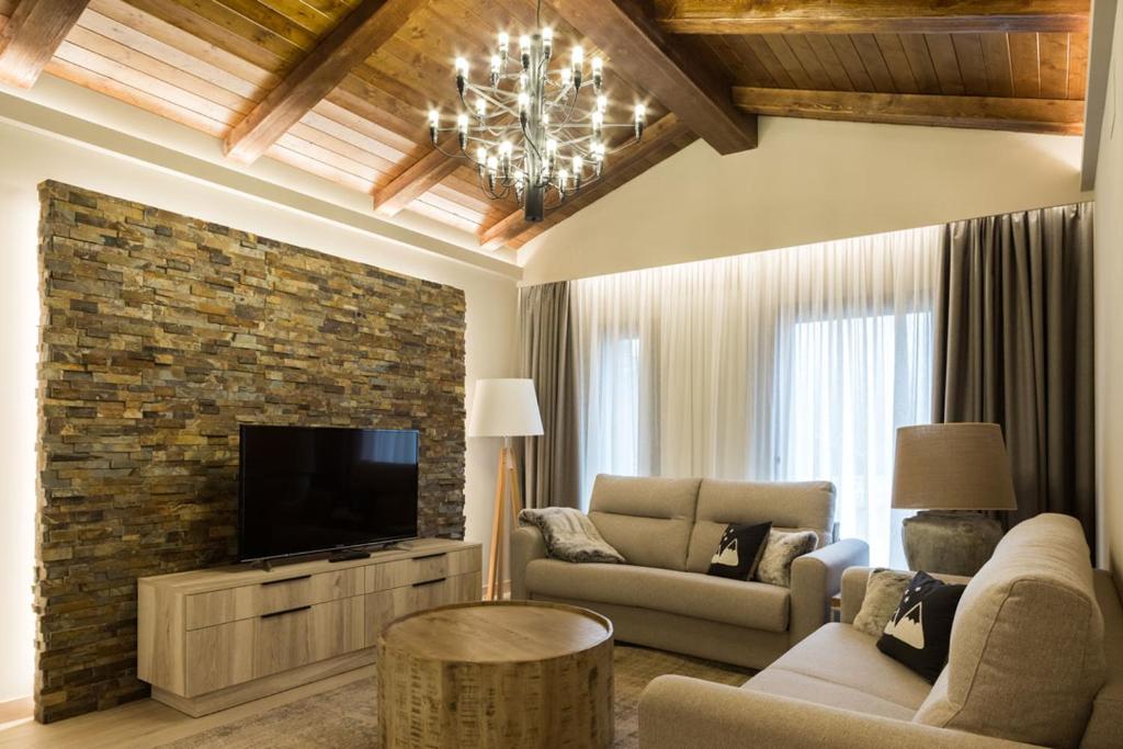 TV a/nebo společenská místnost v ubytování Hotel Montarto