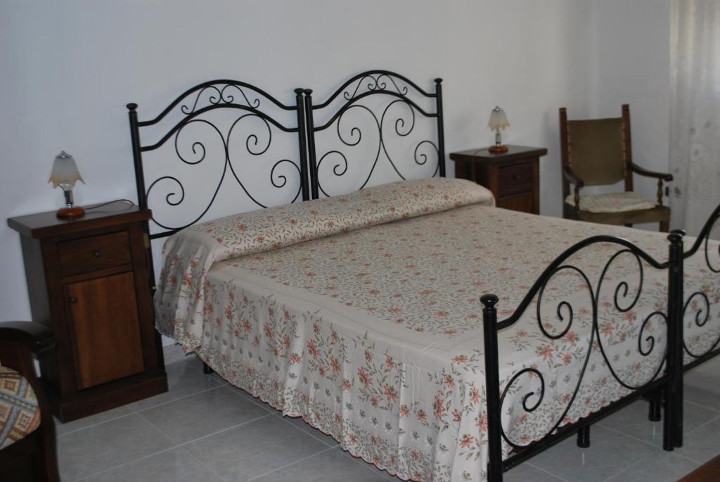 Postel nebo postele na pokoji v ubytování Felline In Bed&Breakfast Dimora di Charme el Salento