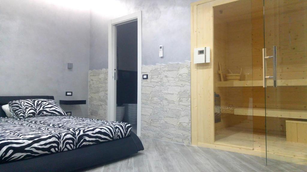Postel nebo postele na pokoji v ubytování Excellence Suite