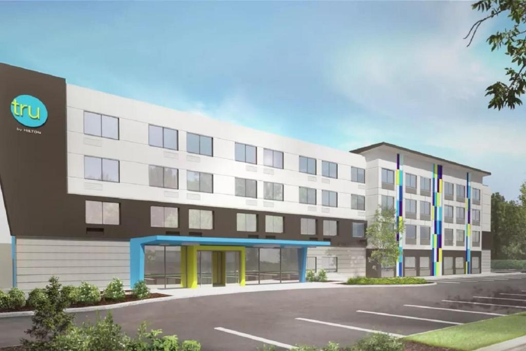a rendering of a building with a parking lot at Tru by Hilton Perrysburg Toledo in Rossford