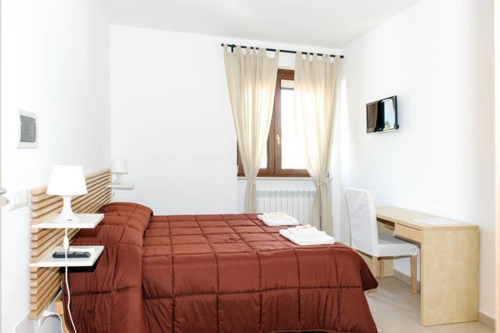 Posteľ alebo postele v izbe v ubytovaní Dimora Mariù - Casa Vacanze