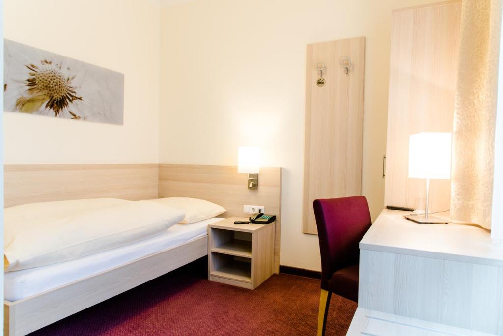 Postel nebo postele na pokoji v ubytování Hotel Pendl