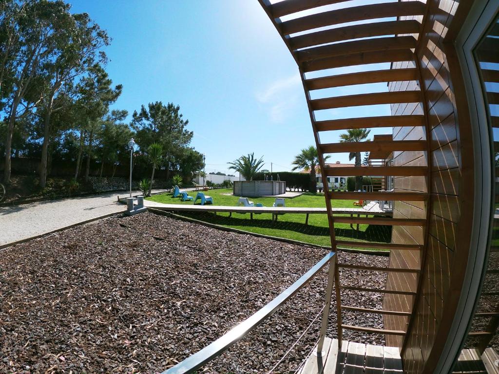 a view of a park from the side of a building at Golden Halcyon - Ericeira Villas in Ericeira
