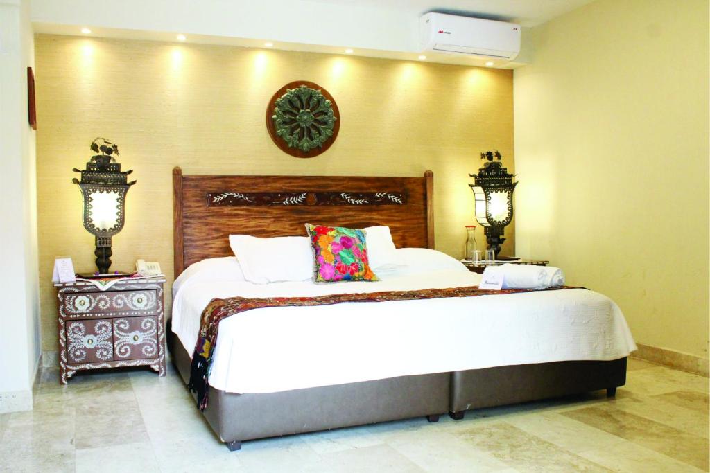 Postel nebo postele na pokoji v ubytování Hotel Lindo Ajijic Bed & Breakfast