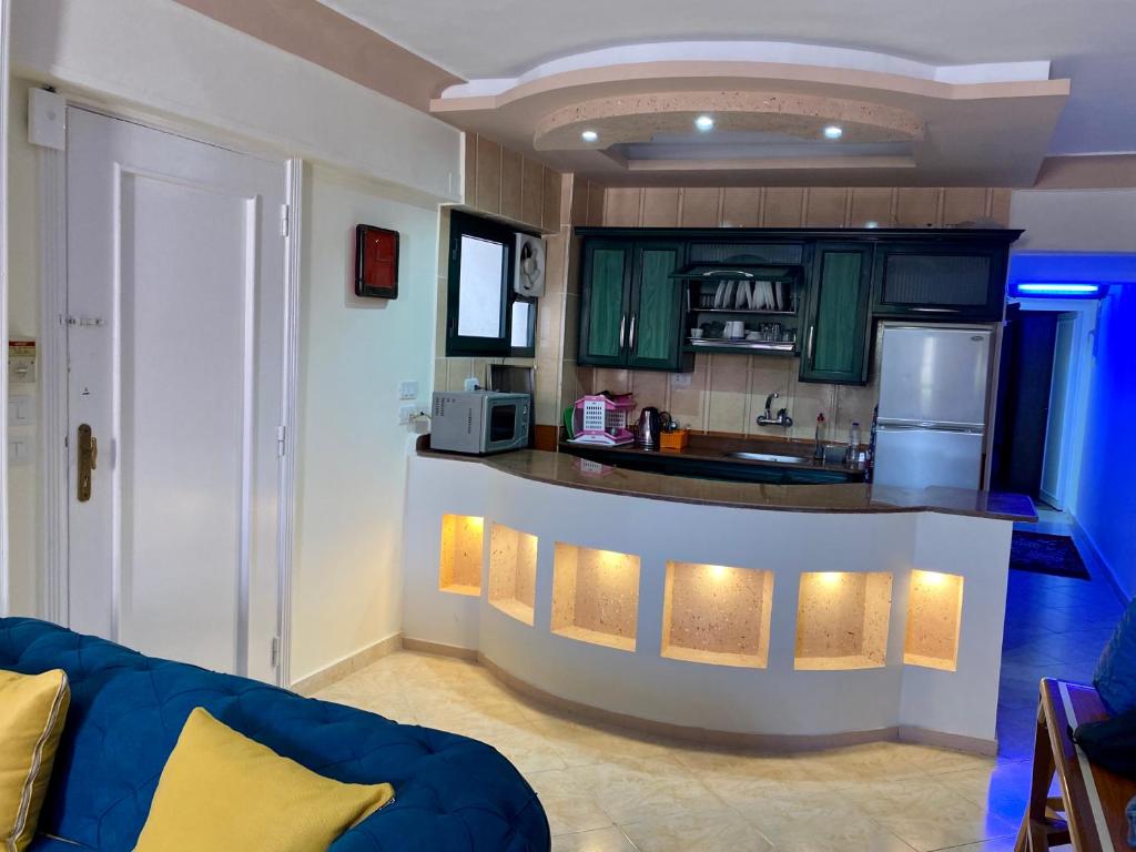 Kuchyň nebo kuchyňský kout v ubytování Seaside Two-Bedroom Chalet Sidi Krir