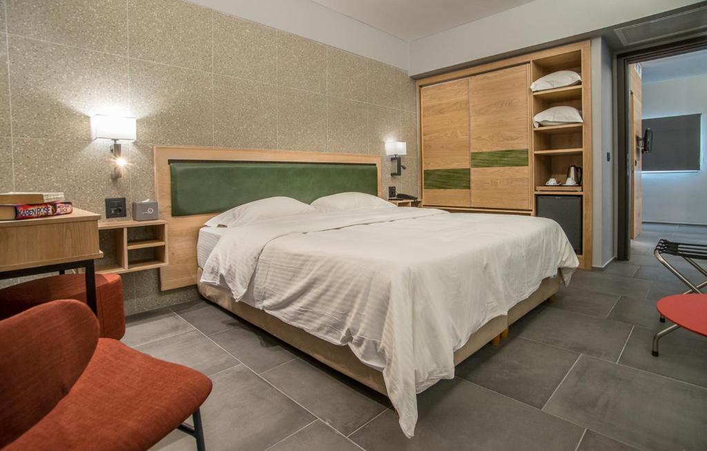 Postel nebo postele na pokoji v ubytování Palmyra Beach Hotel