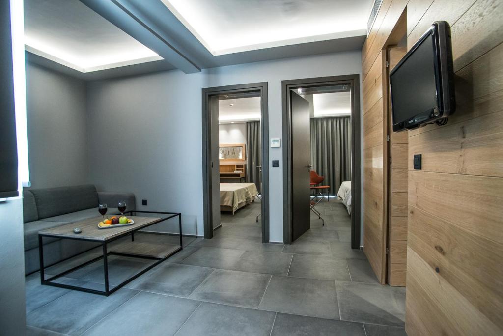 TV a/nebo společenská místnost v ubytování Palmyra Beach Hotel