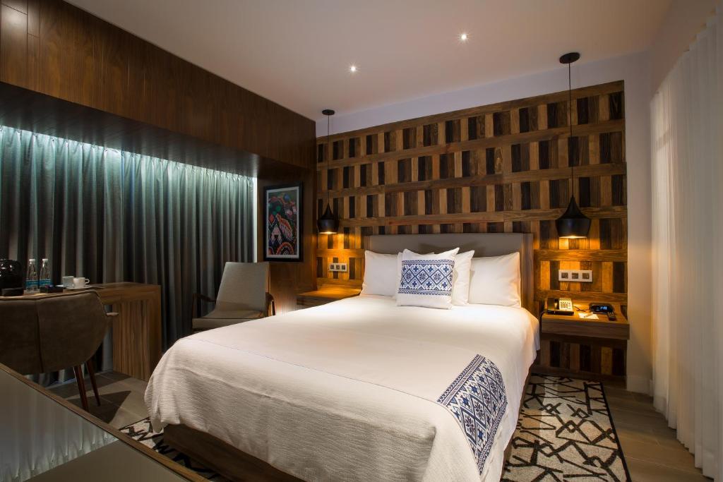 Postel nebo postele na pokoji v ubytování Hotel Indigo Guadalajara Expo by IHG