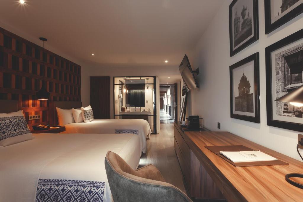 Postel nebo postele na pokoji v ubytování Hotel Indigo Guadalajara Expo by IHG