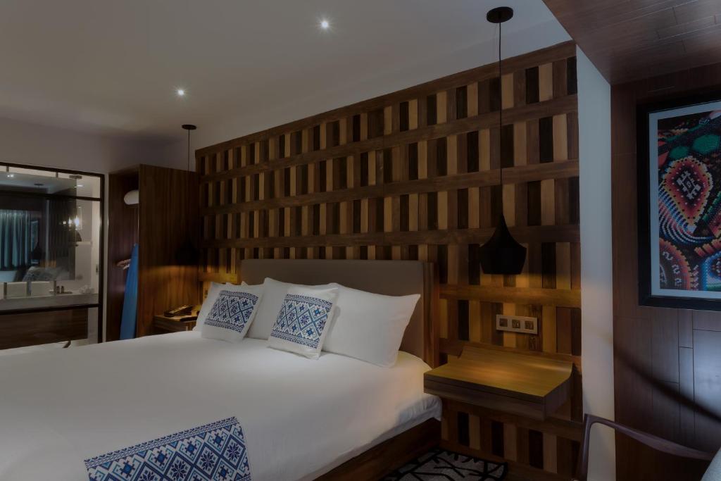 Postel nebo postele na pokoji v ubytování Hotel Indigo Guadalajara Expo by IHG