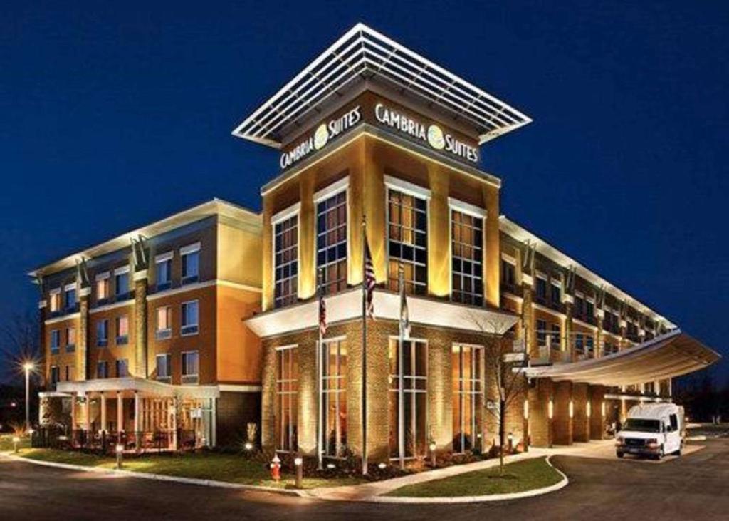 a building with a van parked in front of it at Cambria Hotel Columbus - Polaris in Columbus