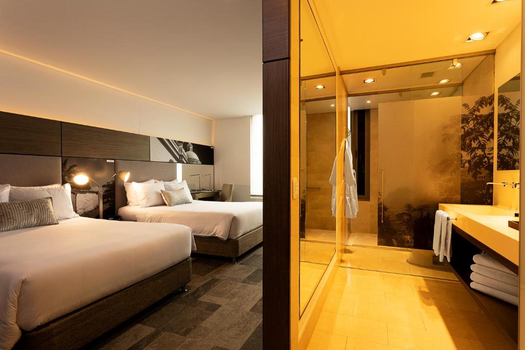 Postel nebo postele na pokoji v ubytování EK Hotel By Preferred Hotels Group