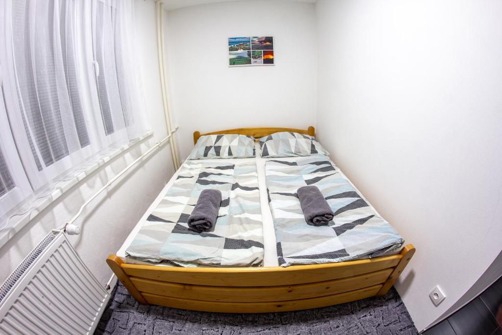 Postel nebo postele na pokoji v ubytování Modern Apartment Klatovy