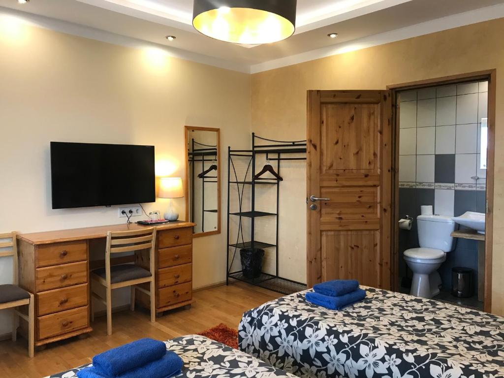 Postel nebo postele na pokoji v ubytování Veeriku Villa