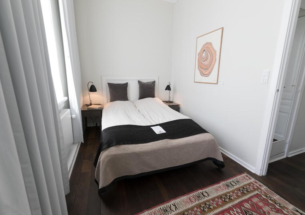 Postel nebo postele na pokoji v ubytování Skovshoved Hotel