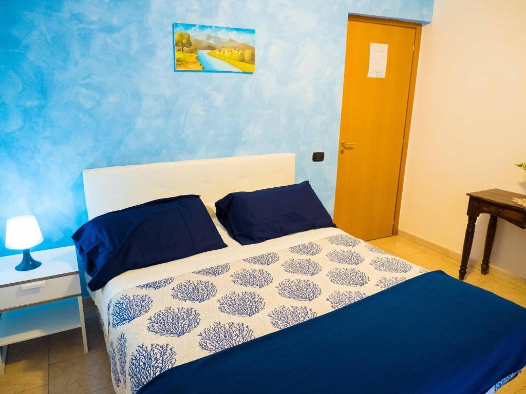 Postel nebo postele na pokoji v ubytování ALBERGO SANT'ANNA