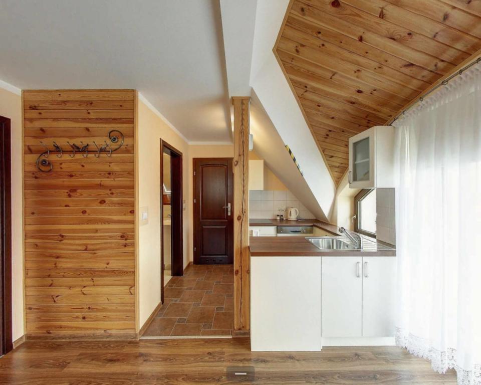 Kuchyň nebo kuchyňský kout v ubytování Villa Jura Pokoje Gościnne