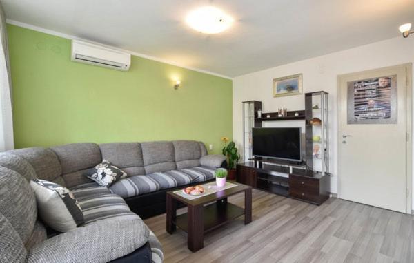 Televízia a/alebo spoločenská miestnosť v ubytovaní Relax apartman Split