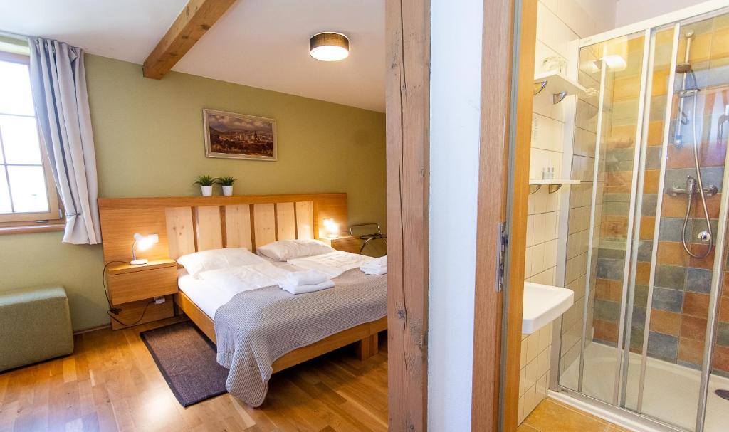 Postel nebo postele na pokoji v ubytování Penzion a vinařství U Vrbů