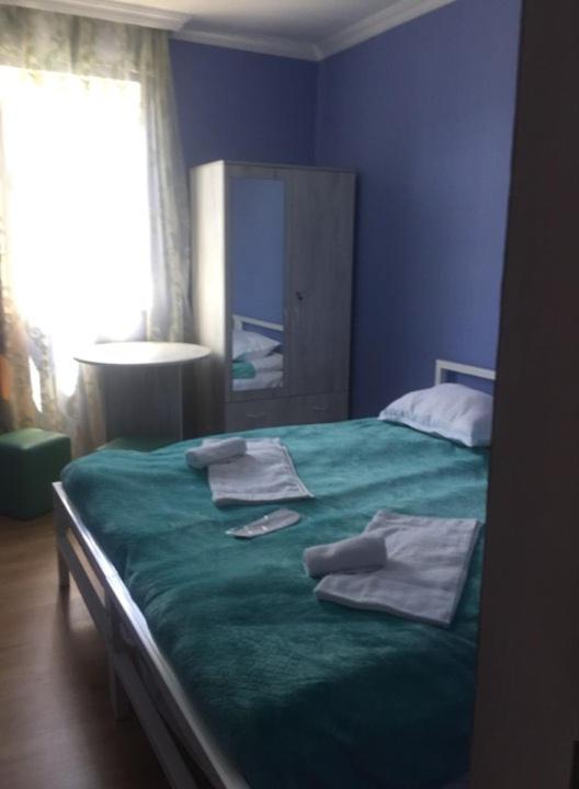 Postel nebo postele na pokoji v ubytování Lali